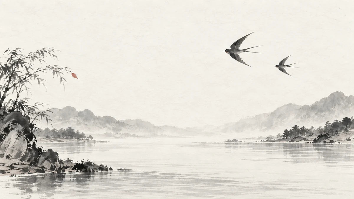 Ink wash illustration: two quiet ink-wash swallows passing above a wide river, one tiny muted cinnabar leaf