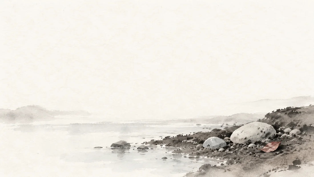 Ink wash painting of a low bank of cool damp soil beside a shallow pool and pale mineral pebbles.